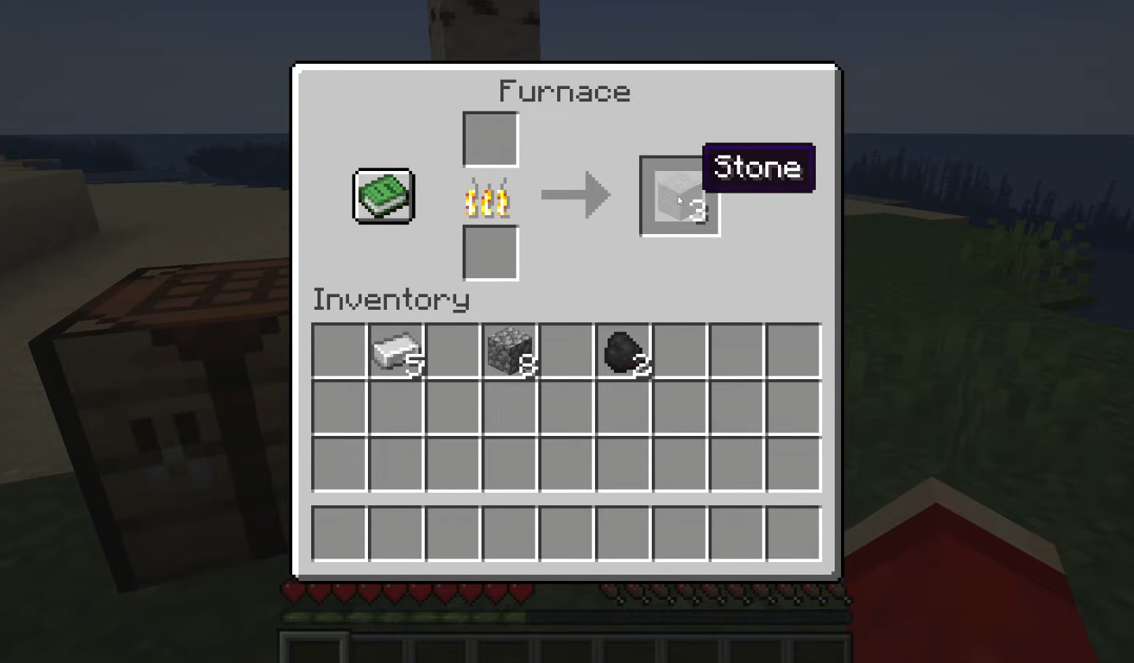 Three Stone ready to collect from a Minecraft Furnace