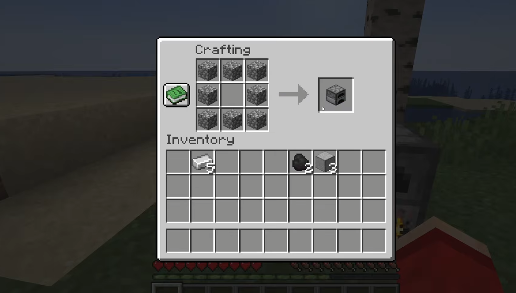 Crafting a regular Furnace with eight Cobblestone in Minecraft