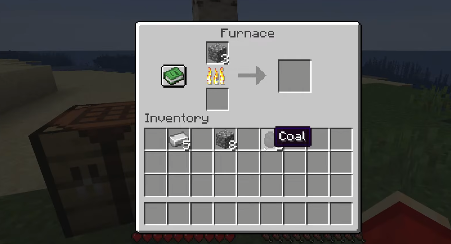 Three Cobblestone being smelted in a Minecraft Furnace